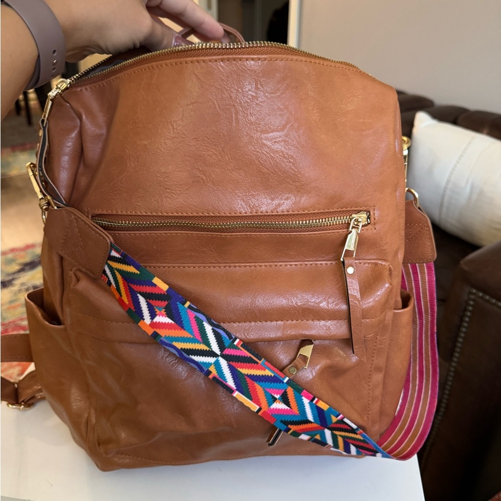 Brown Backpack with Colorful Strap